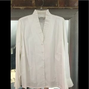 Five button blouse with V-neck and stand up ruffle collar and sleeves.  NWT